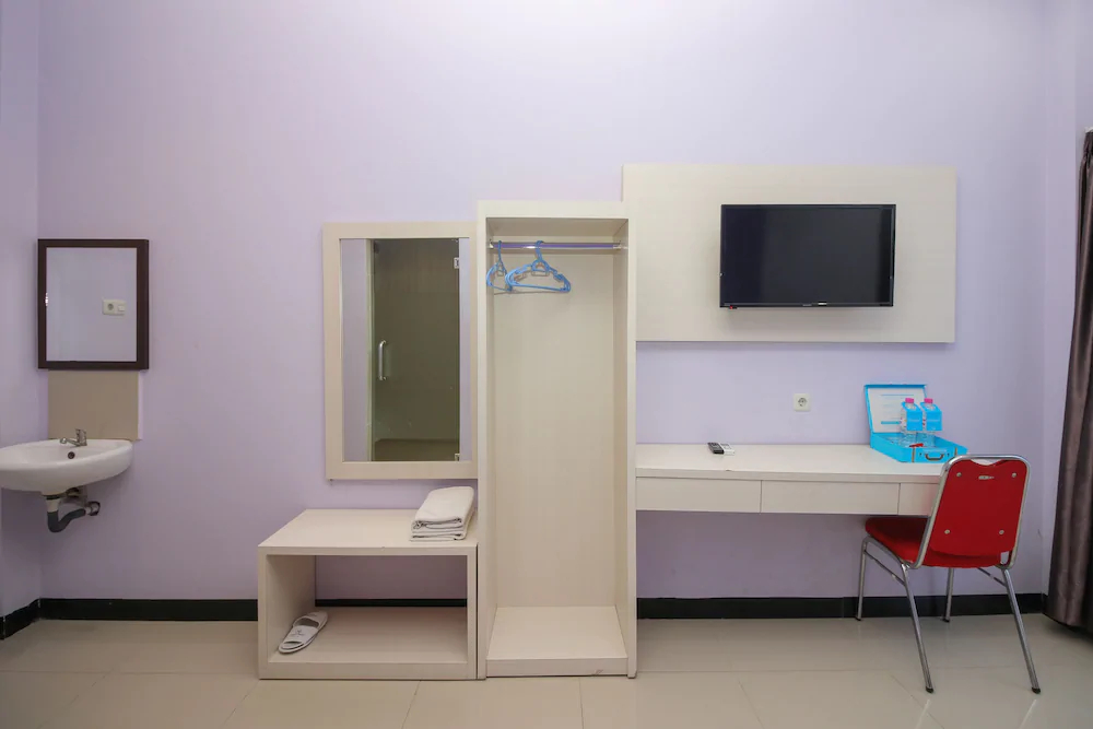 Purple Hotel Palu By Airy Rooms