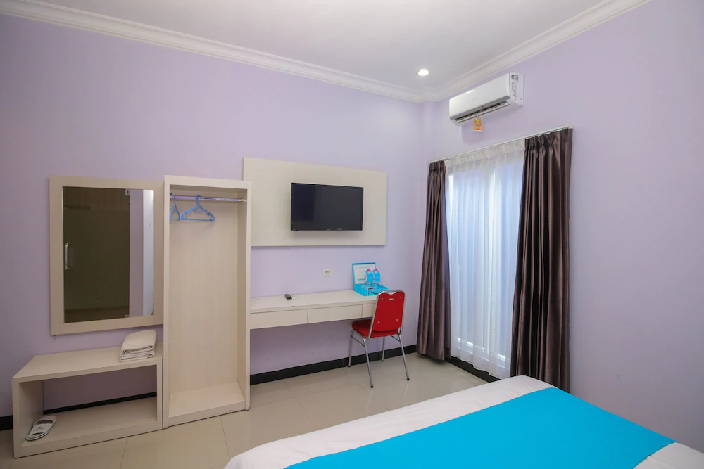 Purple Hotel Palu By Airy Rooms