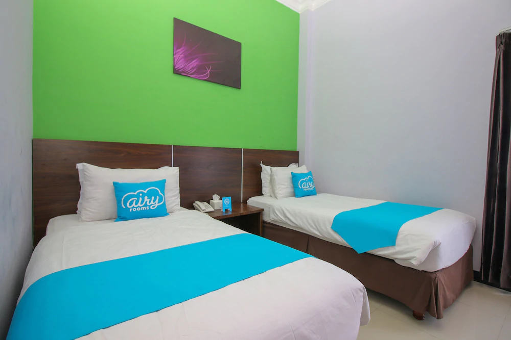 Purple Hotel Palu By Airy Rooms
