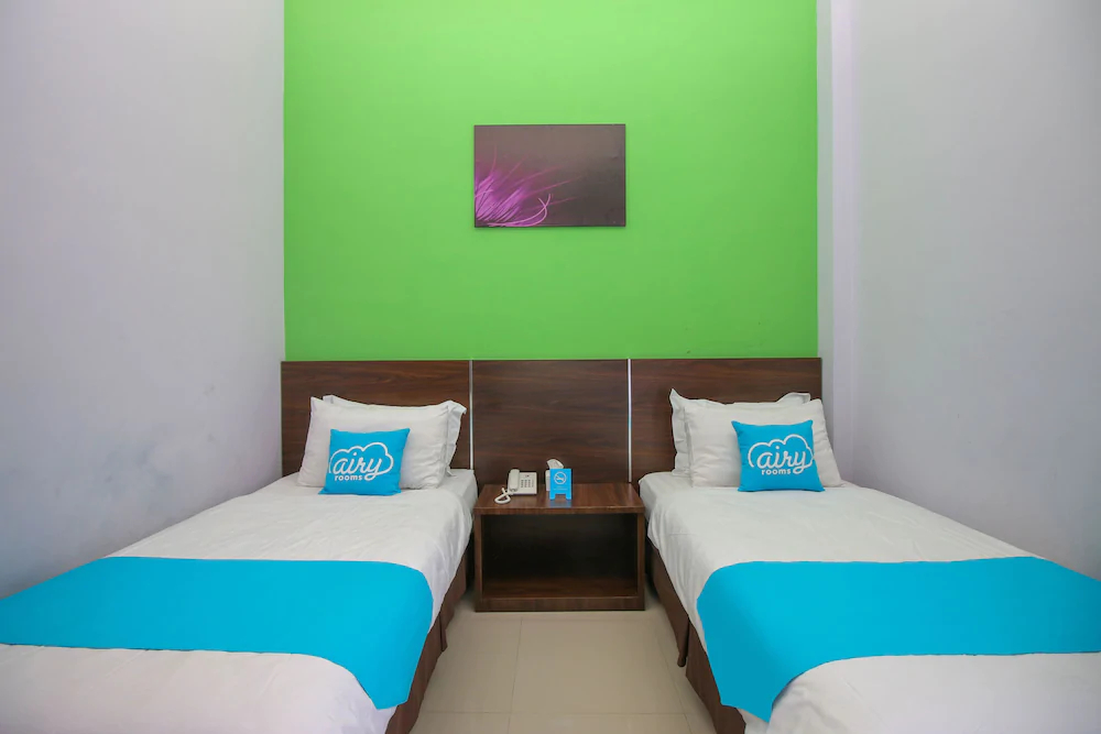 Purple Hotel Palu By Airy Rooms
