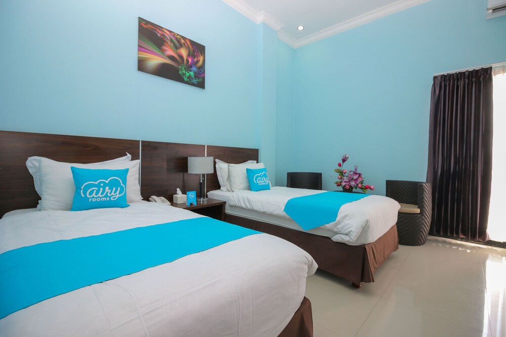 Purple Hotel Palu By Airy Rooms