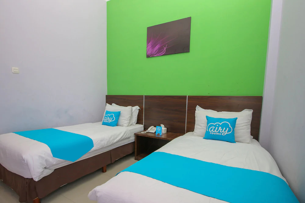 Purple Hotel Palu By Airy Rooms