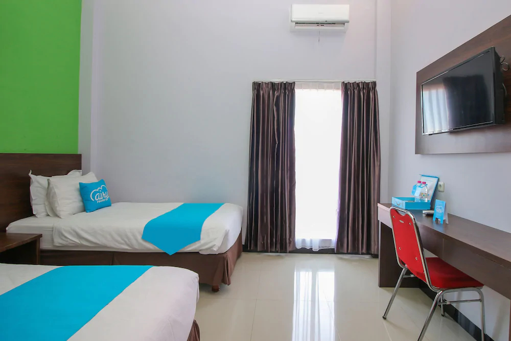 Purple Hotel Palu By Airy Rooms