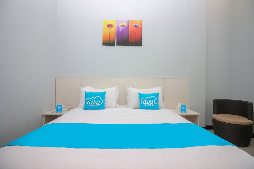 Purple Hotel Palu By Airy Rooms