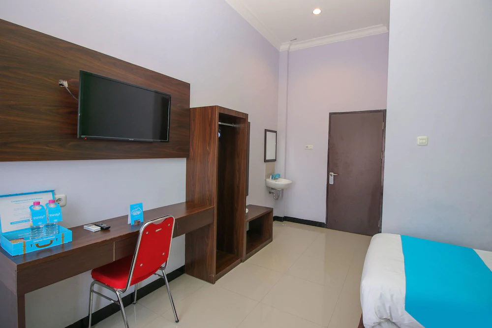 Purple Hotel Palu By Airy Rooms
