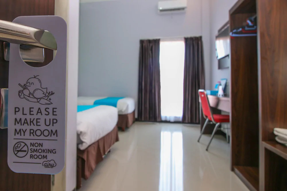 Purple Hotel Palu By Airy Rooms