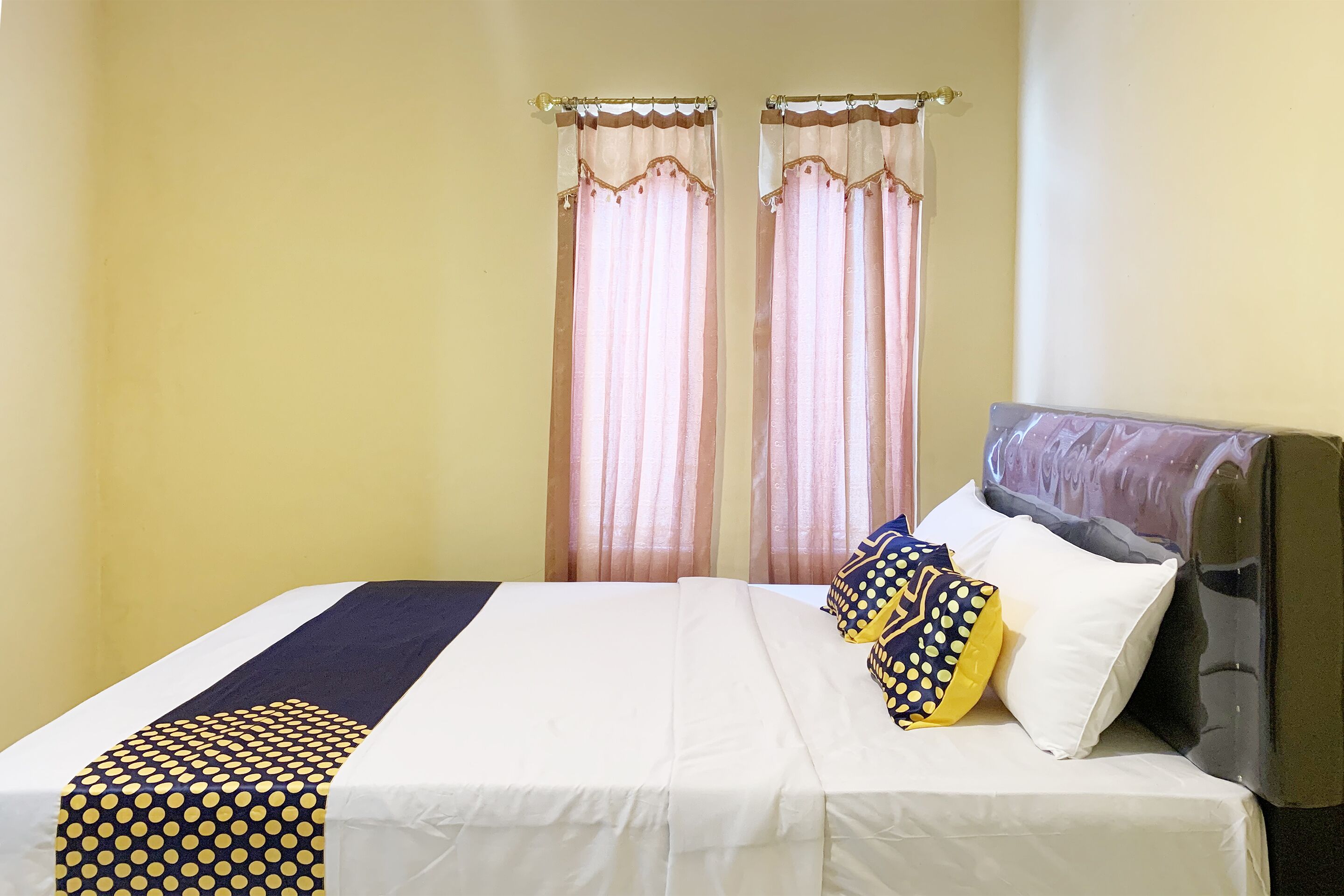 Mande Guesthouse by RedDoorz