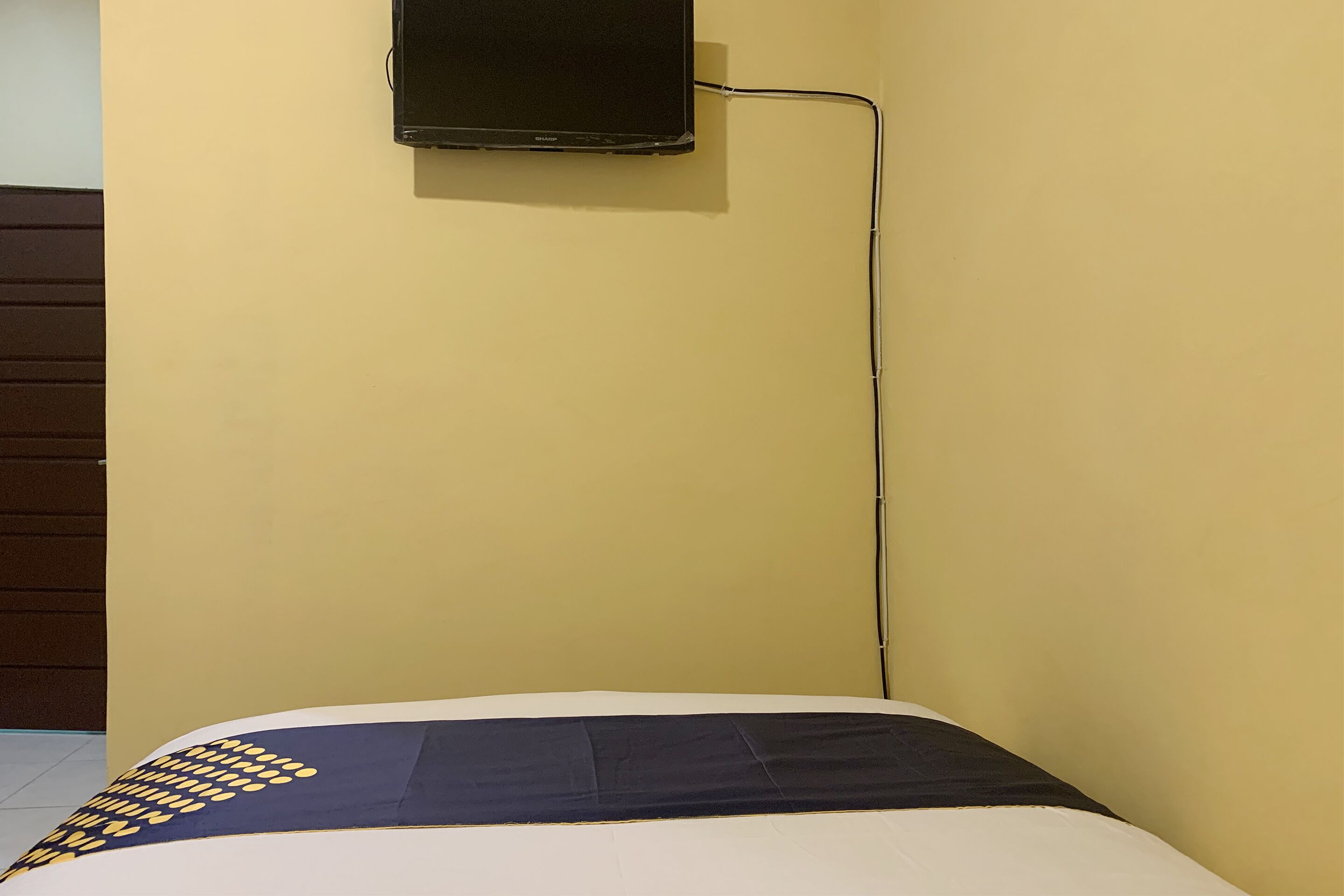 Mande Guesthouse by RedDoorz