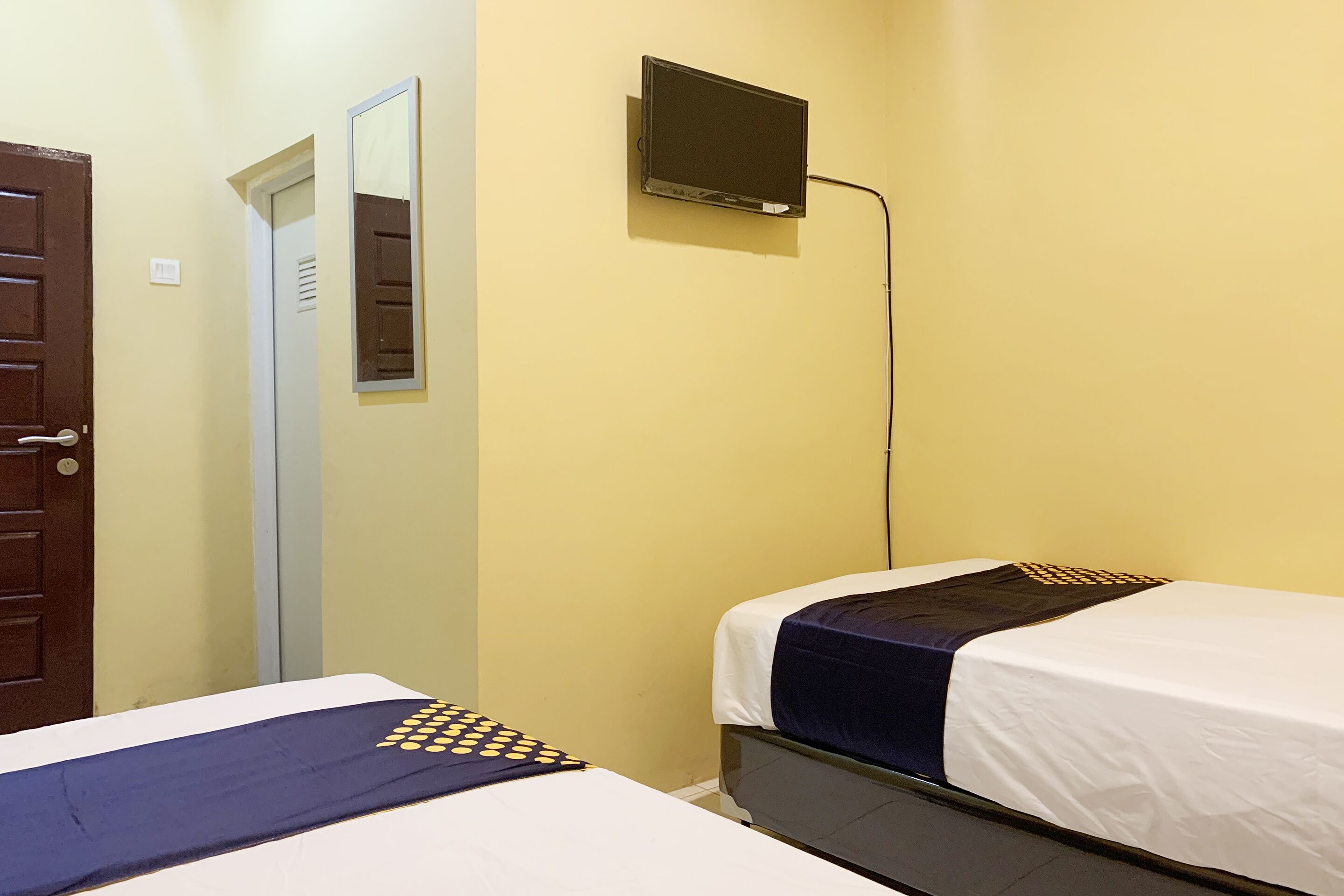 Mande Guesthouse by RedDoorz