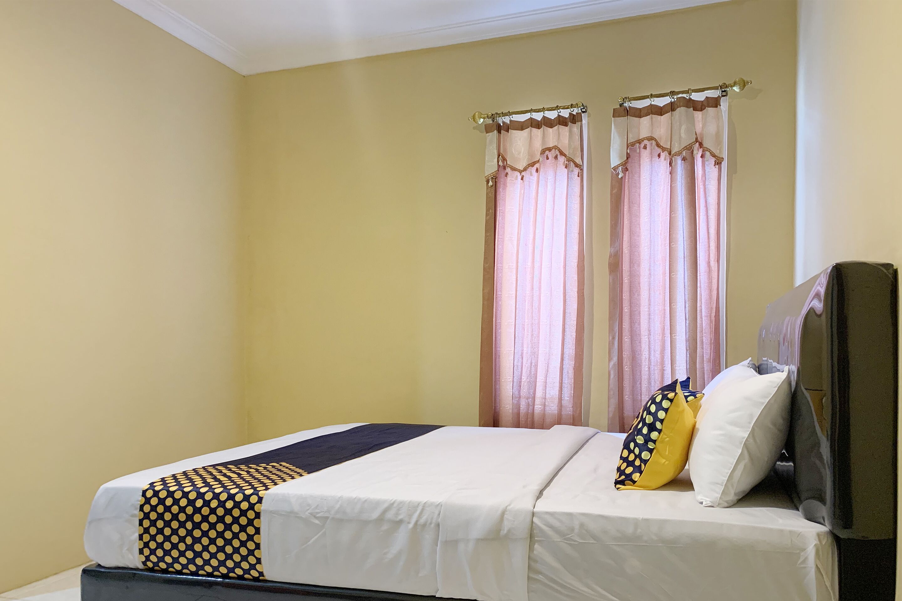 Mande Guesthouse by RedDoorz