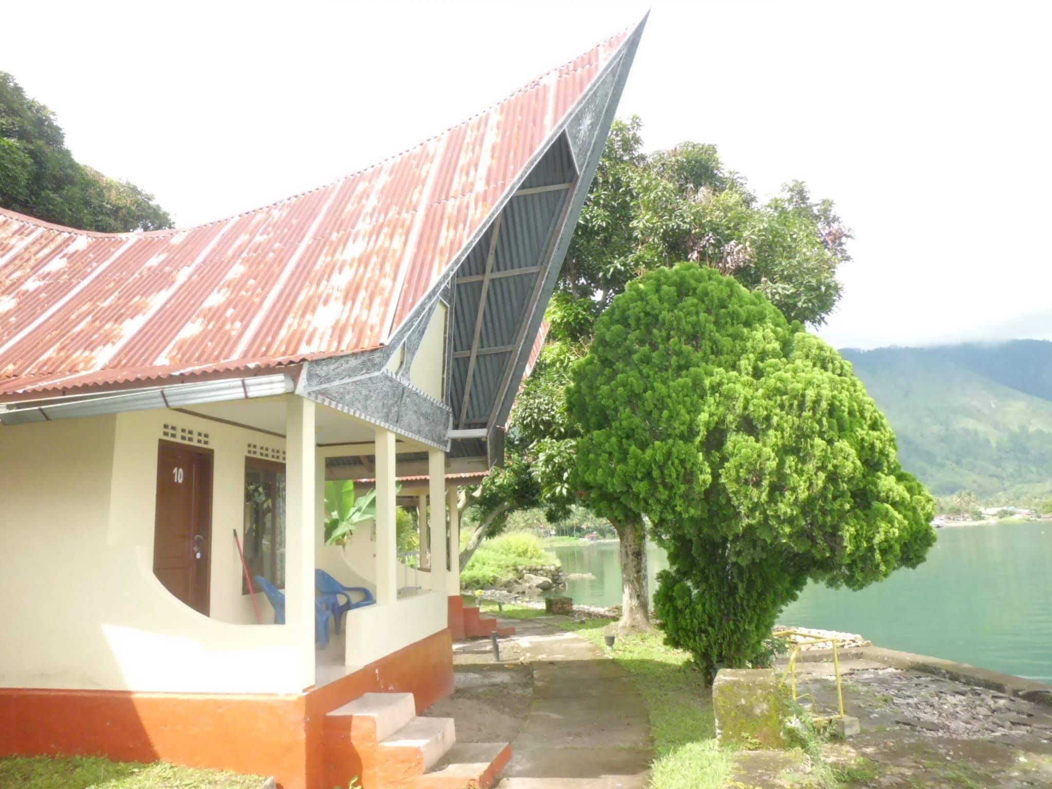 Tuk Tuk Timbul Bungalows