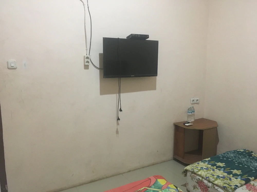 Sentosa Hotel by OYO Rooms