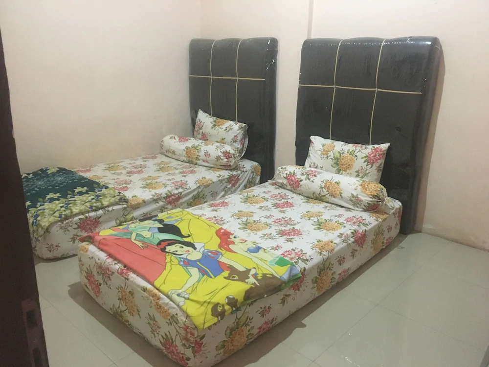 Sentosa Hotel by OYO Rooms