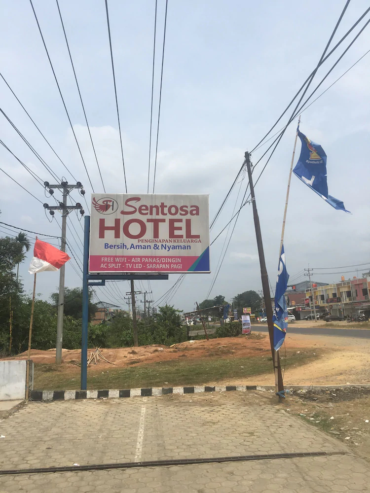 Sentosa Hotel by OYO Rooms