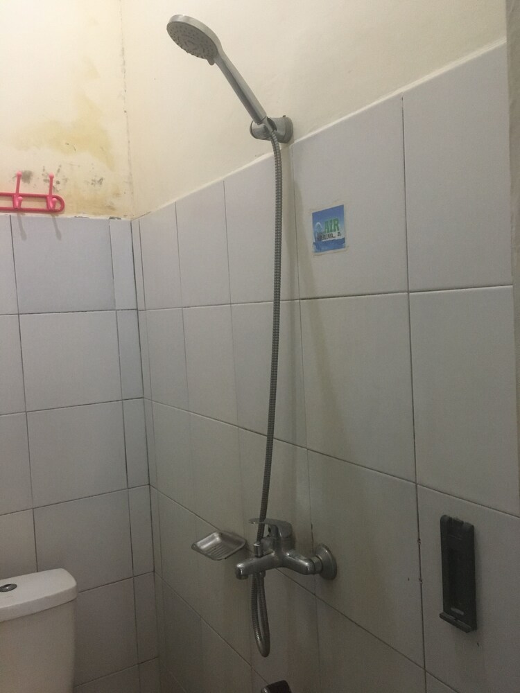 Sentosa Hotel by OYO Rooms