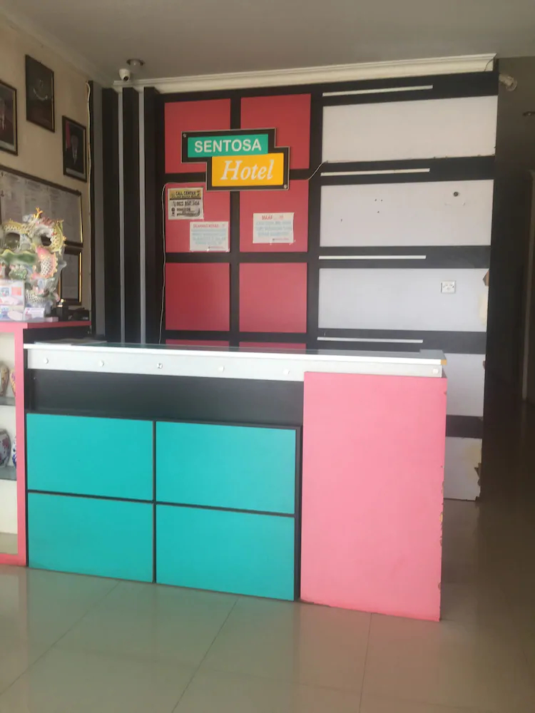 Sentosa Hotel by OYO Rooms