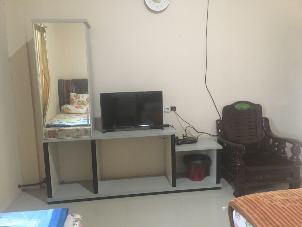 Sentosa Hotel by OYO Rooms