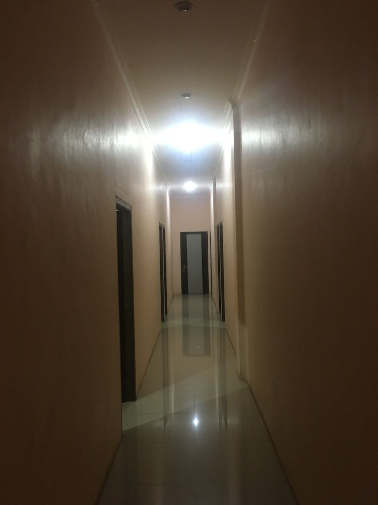 Sentosa Hotel by OYO Rooms