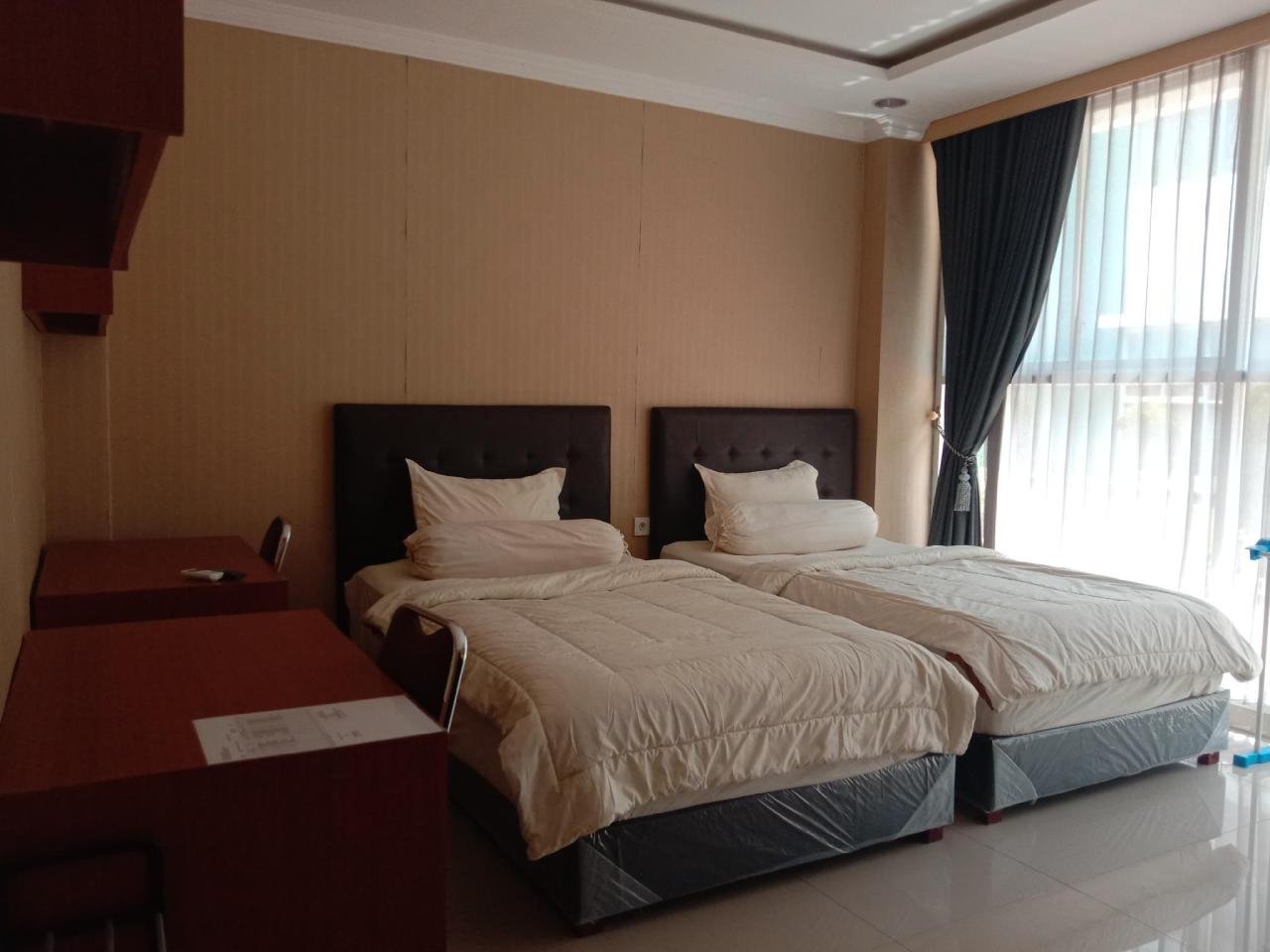 Alpha Hotel Syariah by OYO Rooms