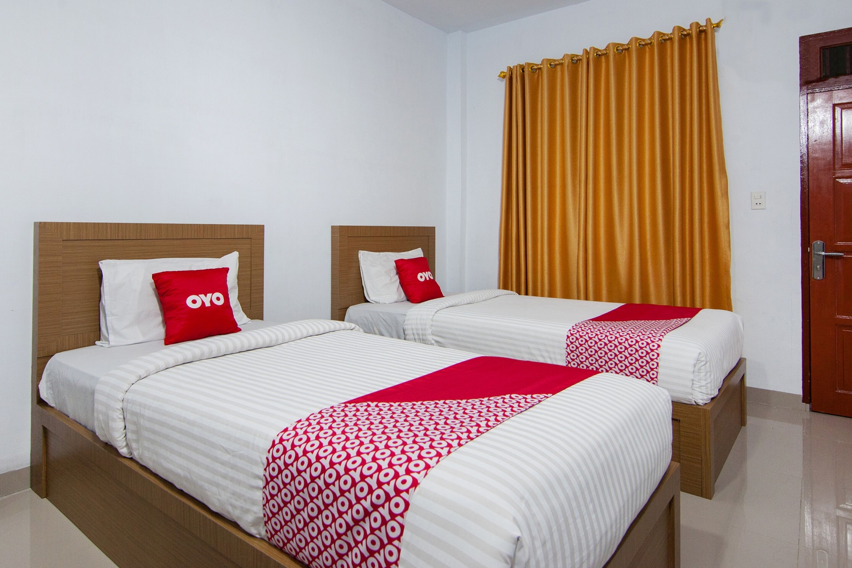 Thyesza Hotel by OYO Rooms