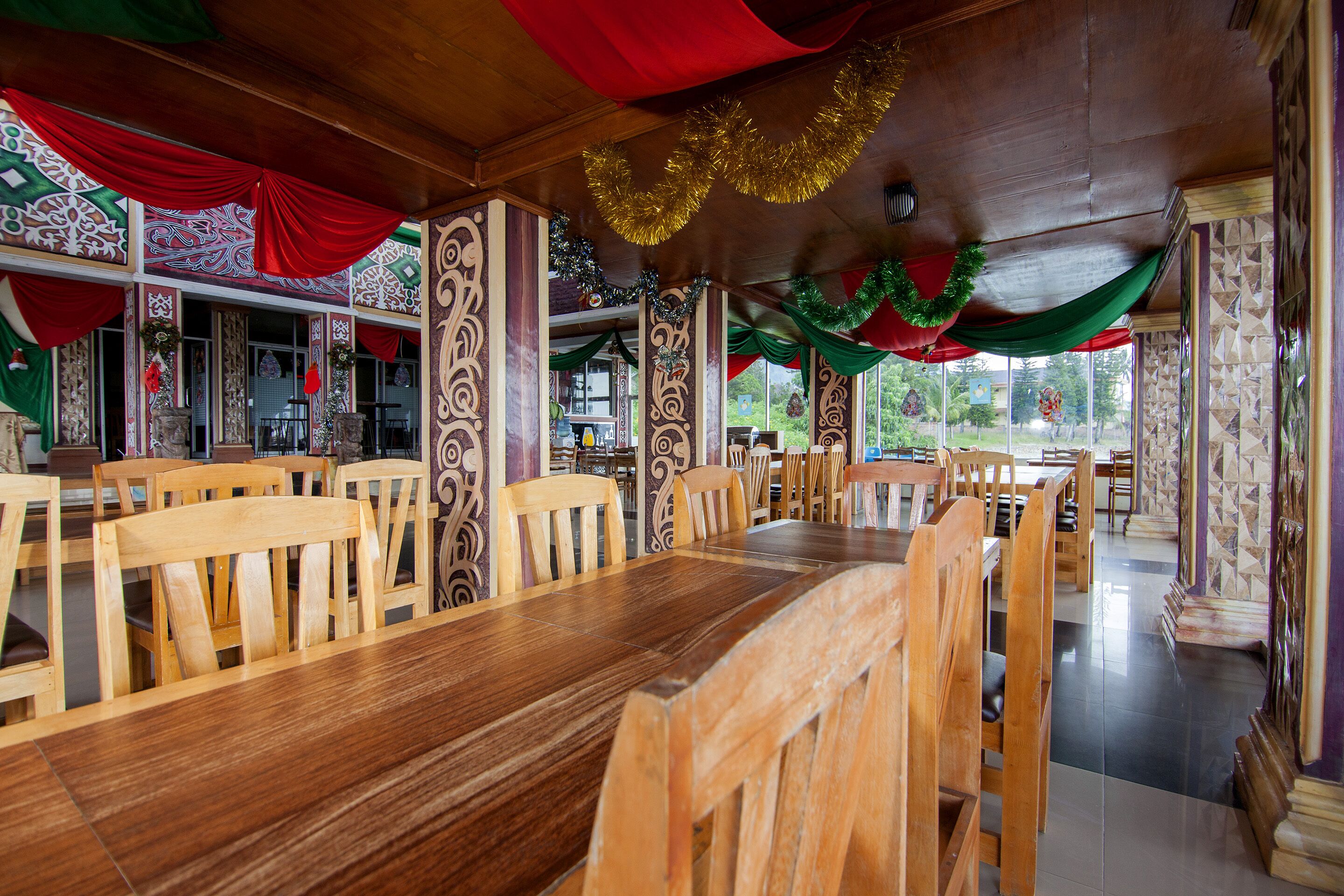 Thyesza Hotel by OYO Rooms