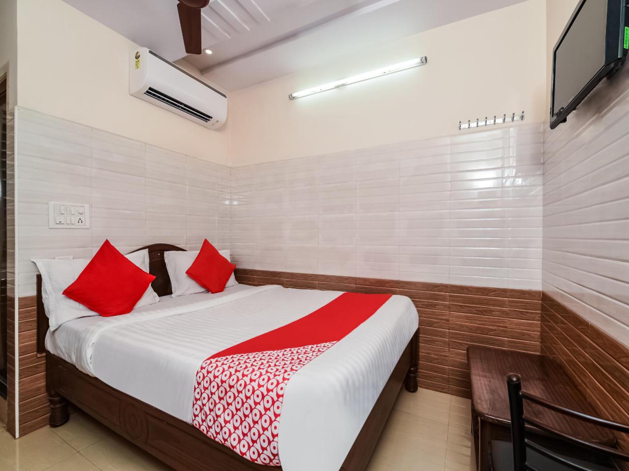 Varsha Grand Residence by OYO Rooms