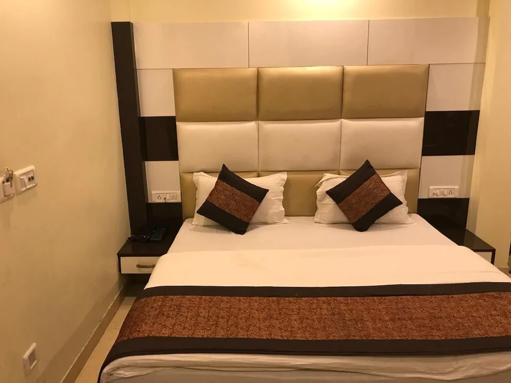 Hotel Olive International by ADB Rooms