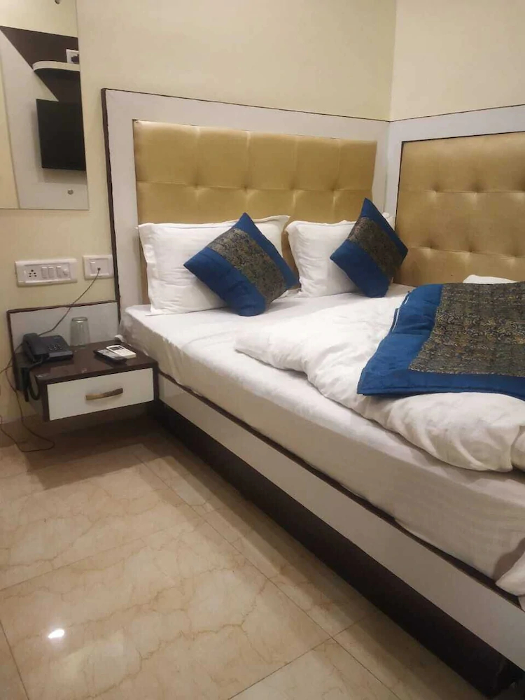 Hotel Olive International by ADB Rooms