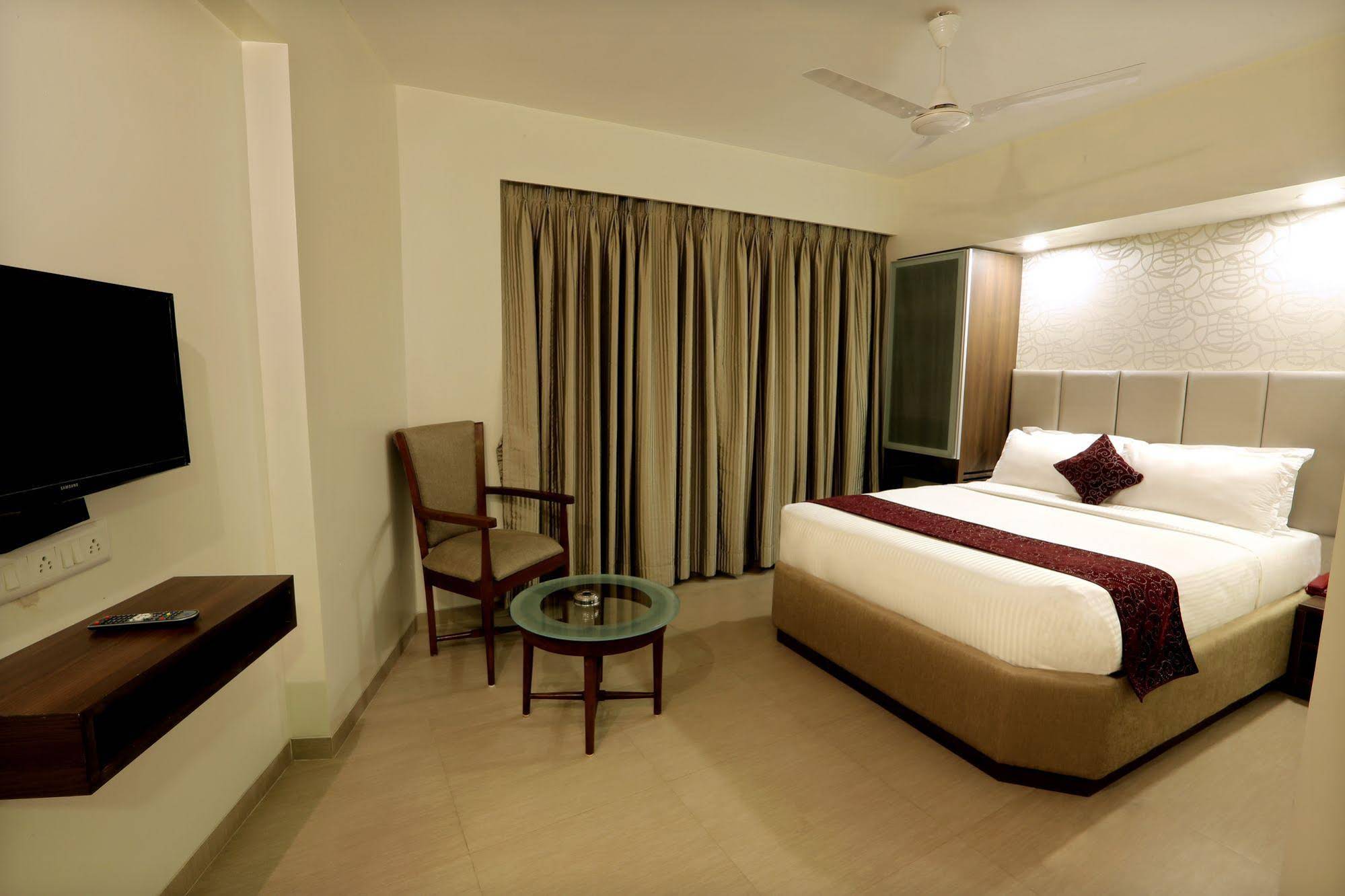 Central Beacon Hotel Surat