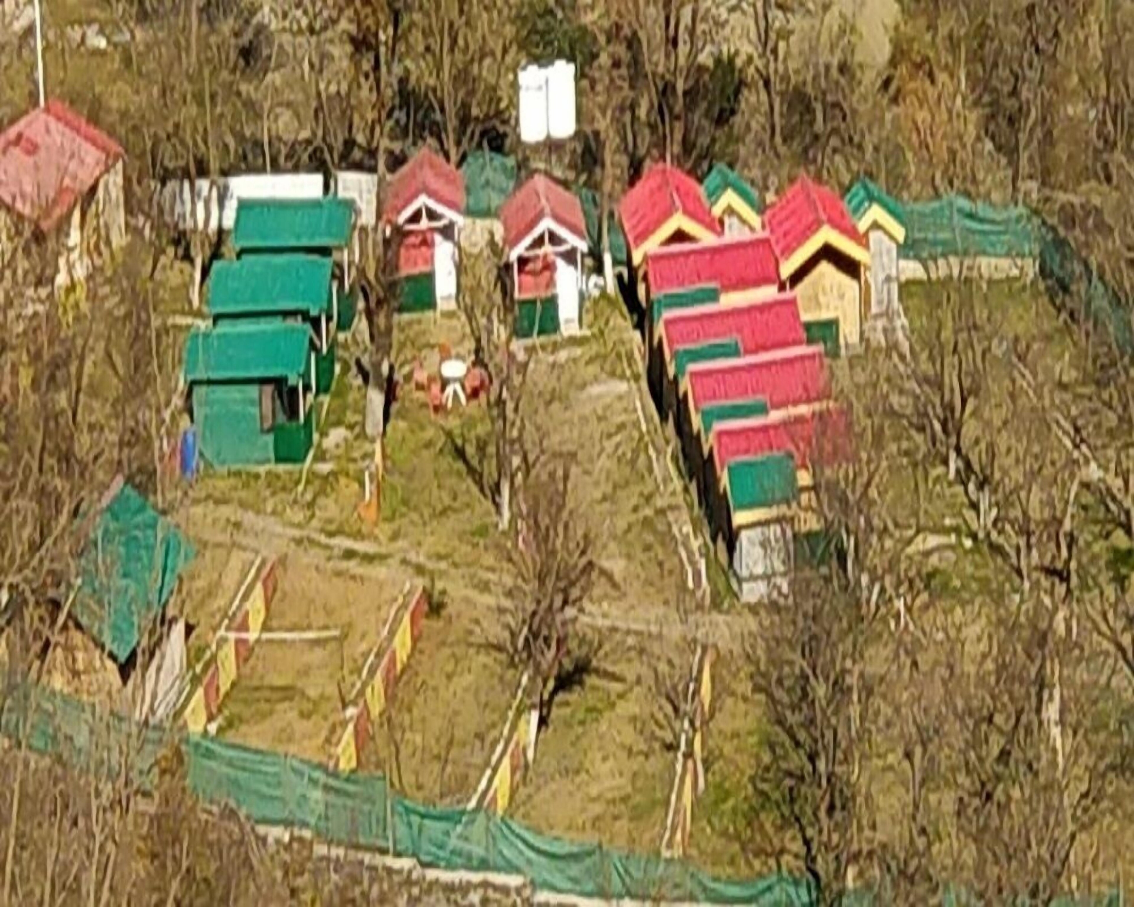 Tirthan Village Huts