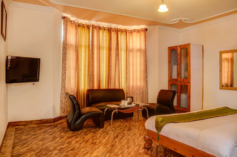 Wood Stock Inn by Treebo Hotels