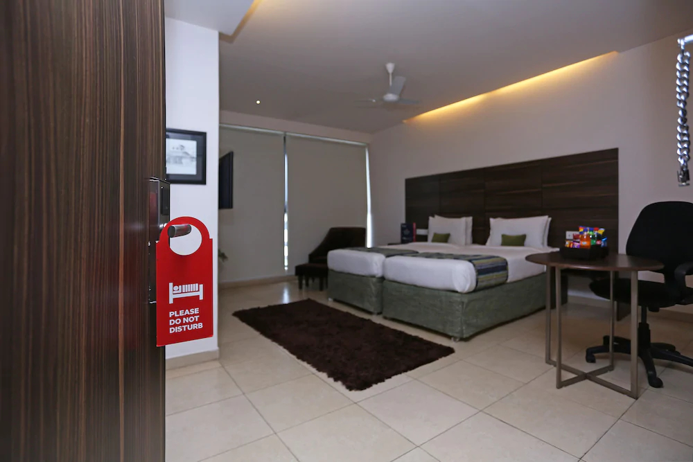 Oasis Hotel  by OYO Rooms
