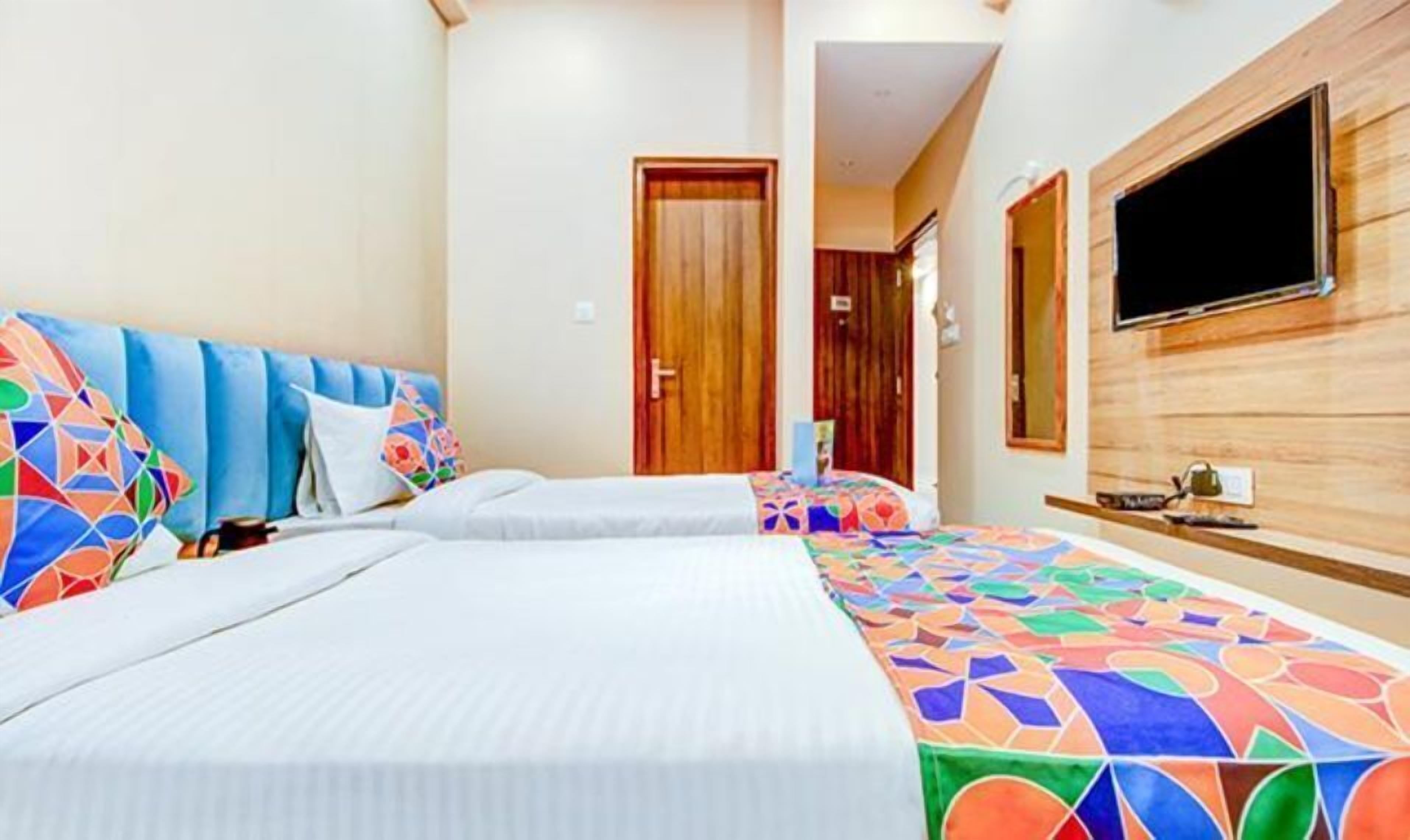 Hotel 7th Crossing by FabHotel