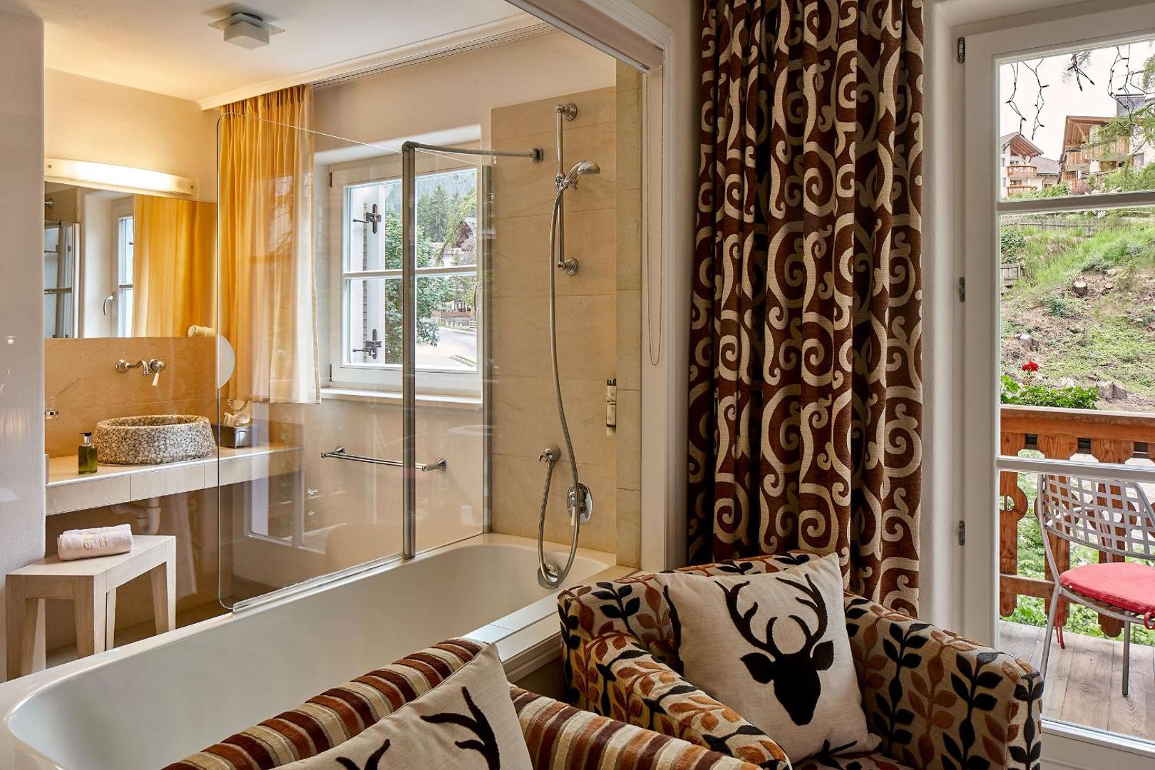 Dolomit Homes & Hotel