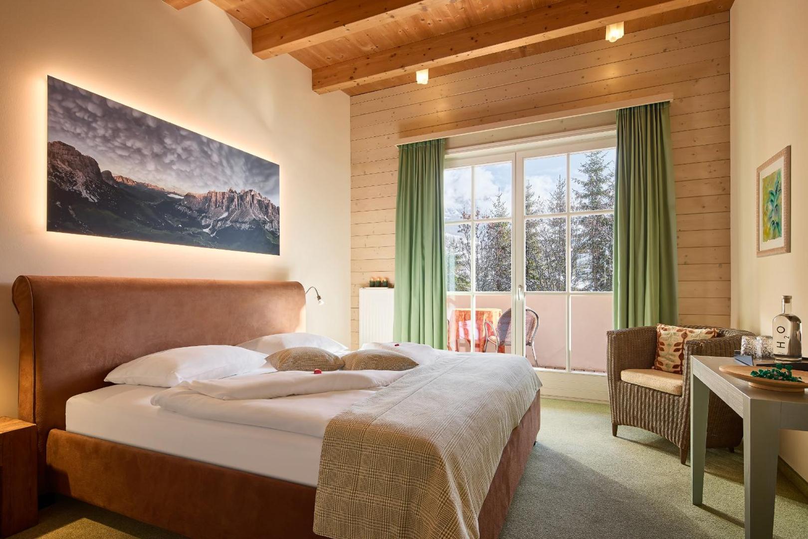 Dolomit Homes & Hotel