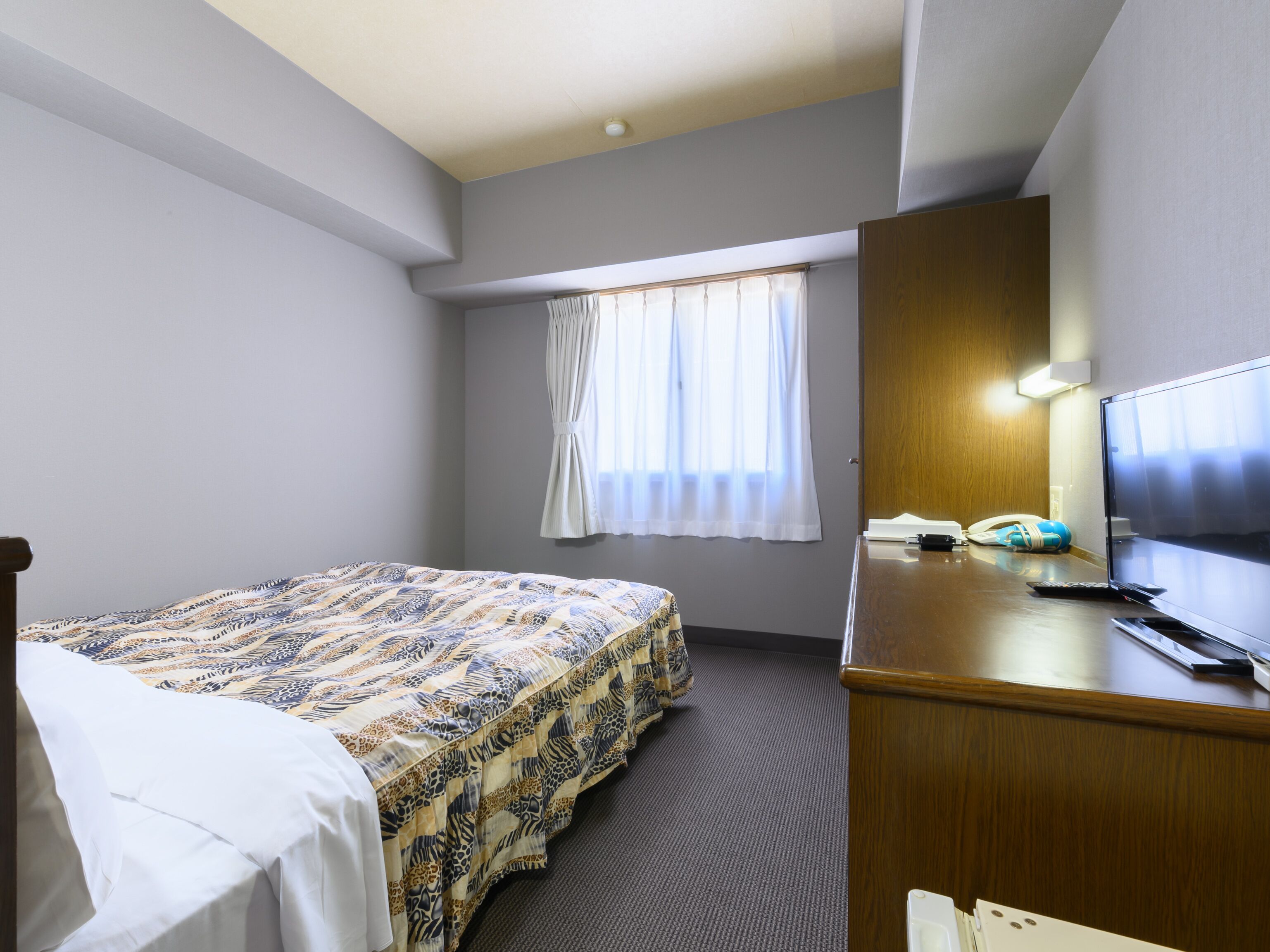 Tabist IWATA Station Hotel