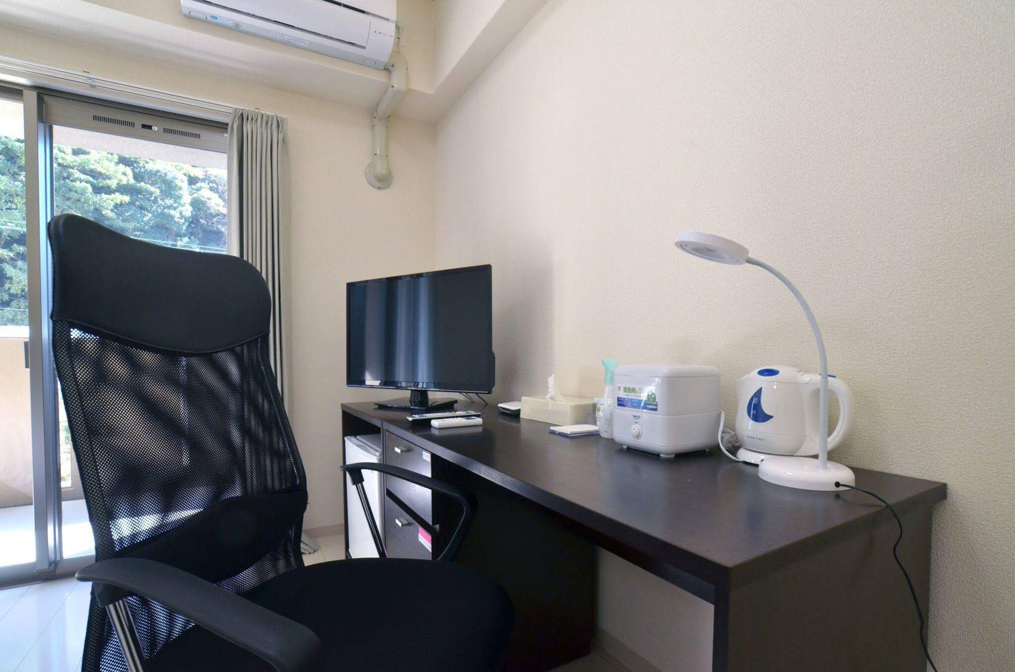 New Station Hotel Residence