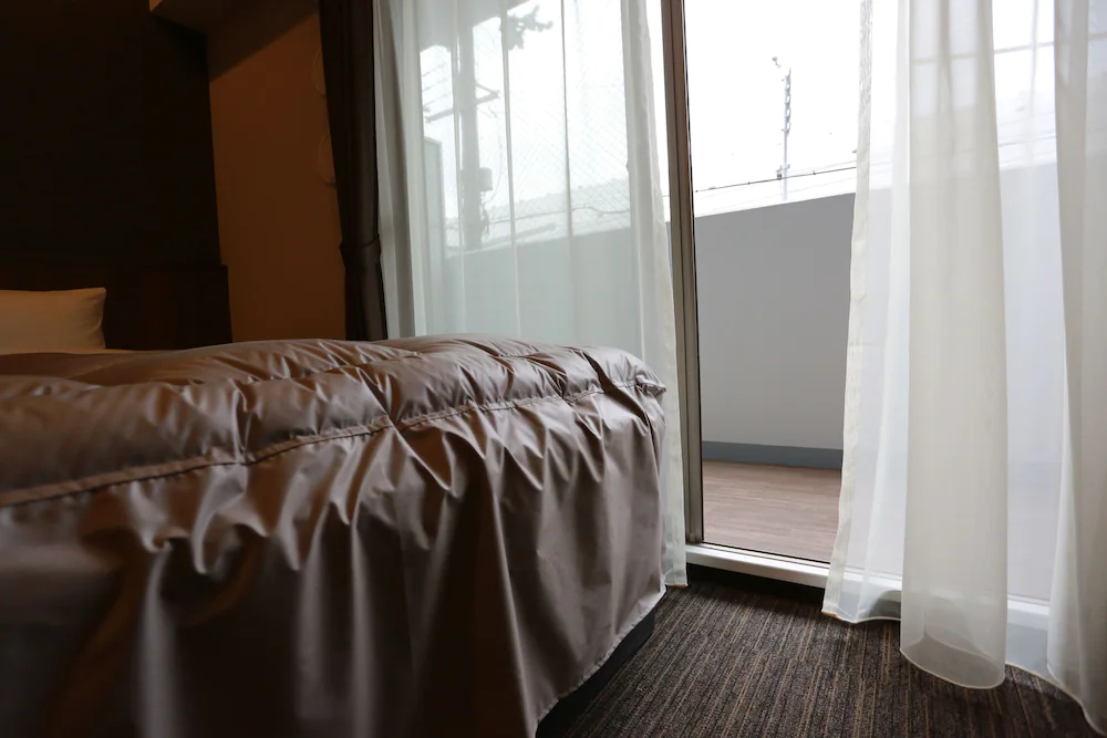 The Base Sakaihigashi Apartment Hotel