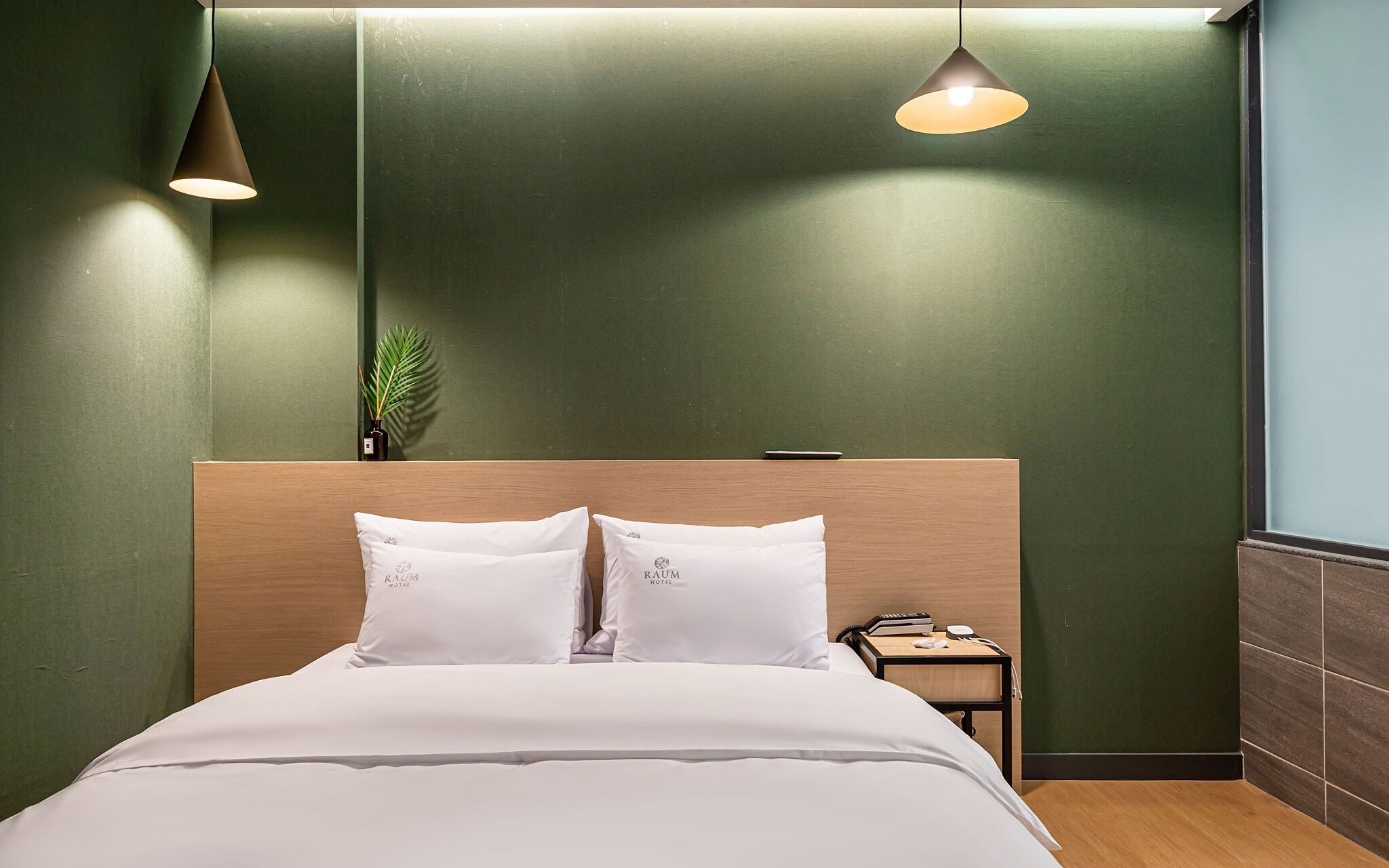 Osan Hotel Raum