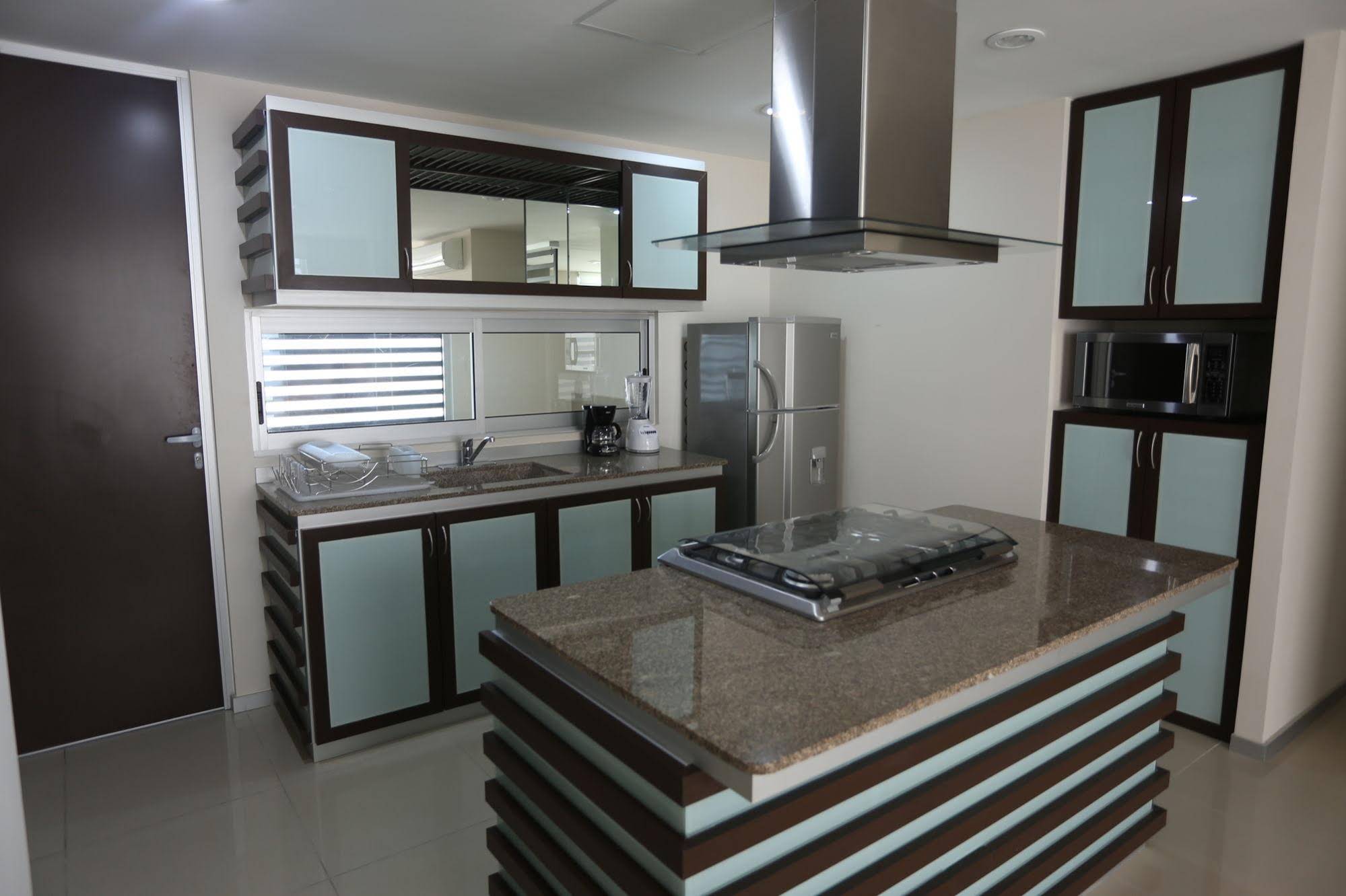 Quetzalcoatl Hotel & Suites Deluxe