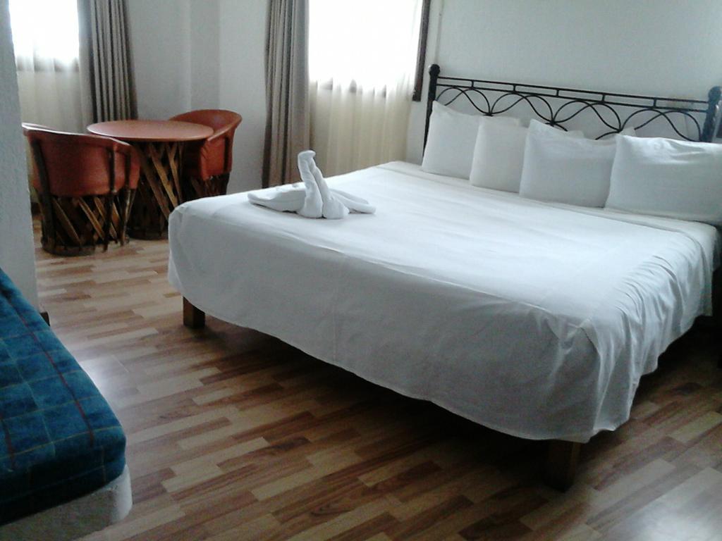 Capital O Hotel Central