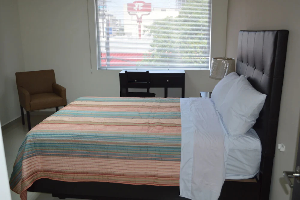 Ayenda Suites Ejecutivas Monterrey