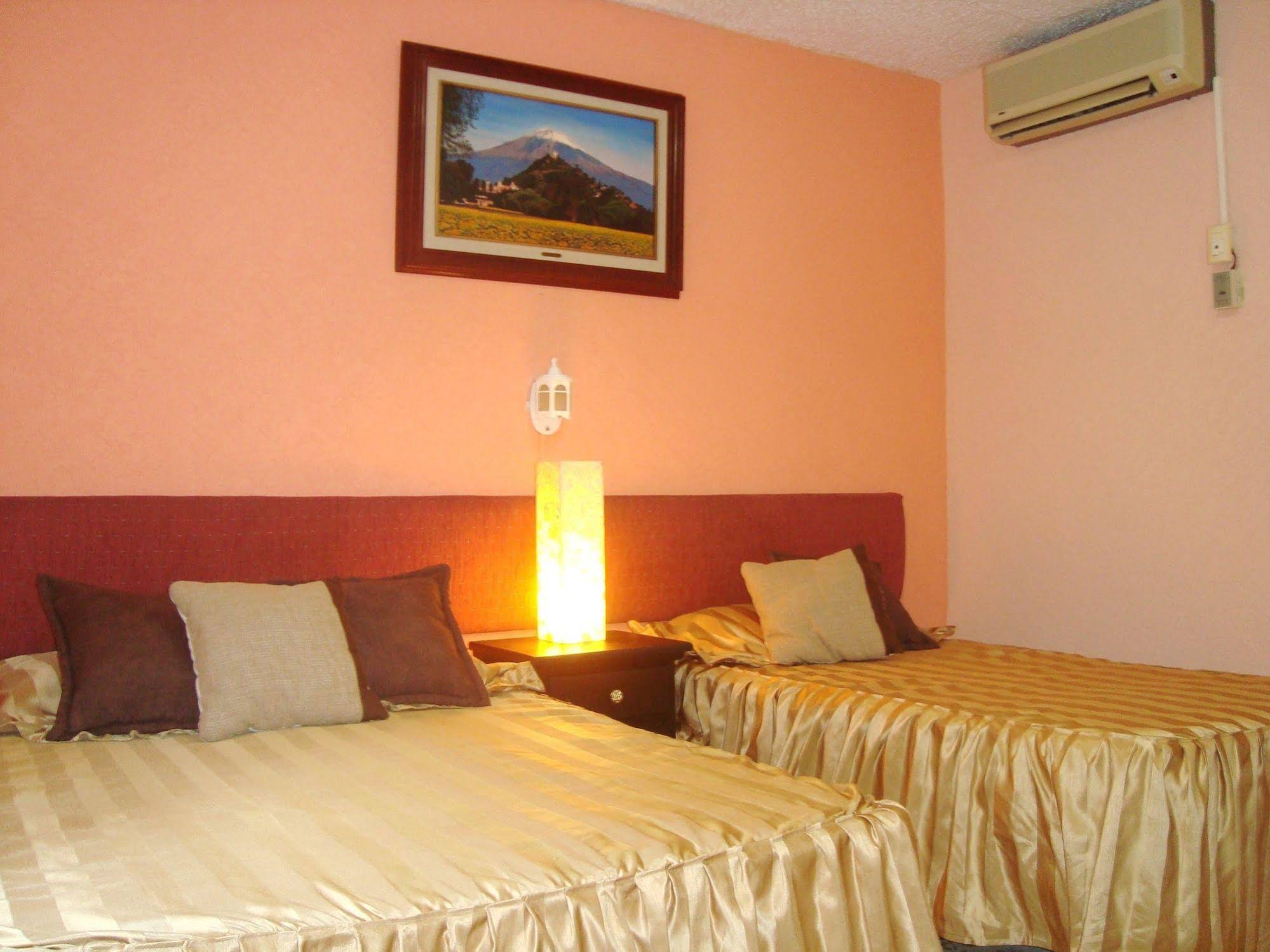 Suites Angelopolis