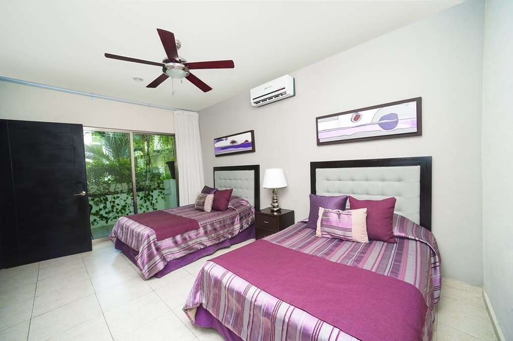 Encanto Riviera Condo Hotel