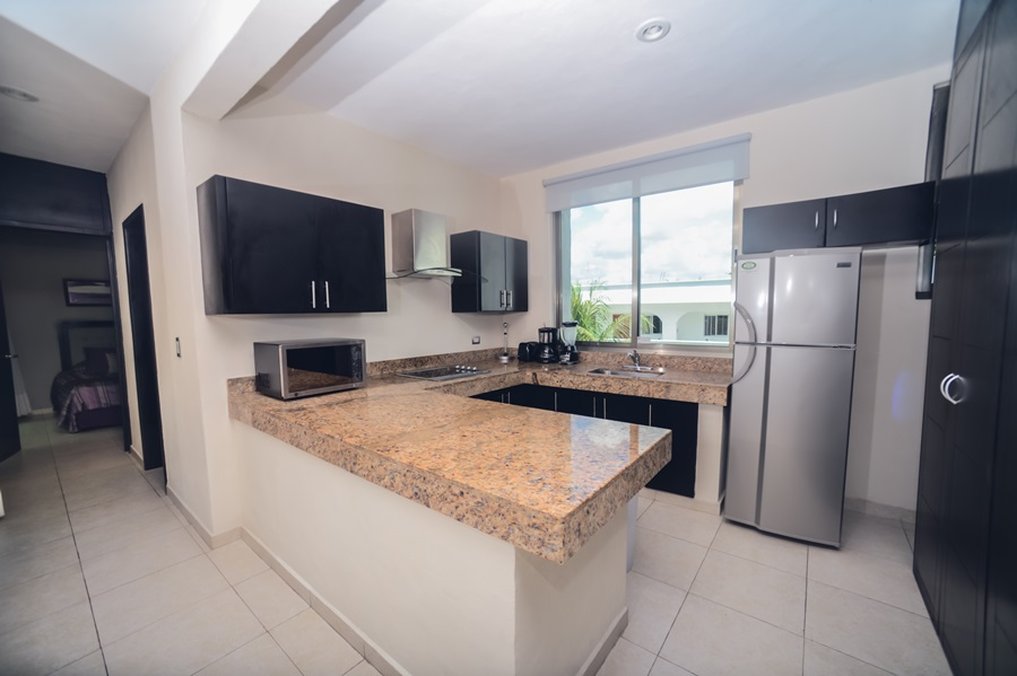Encanto Riviera Condo Hotel