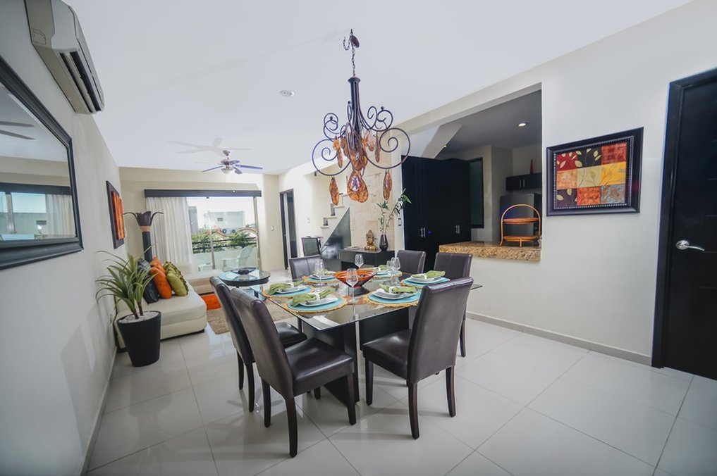 Encanto Riviera Condo Hotel