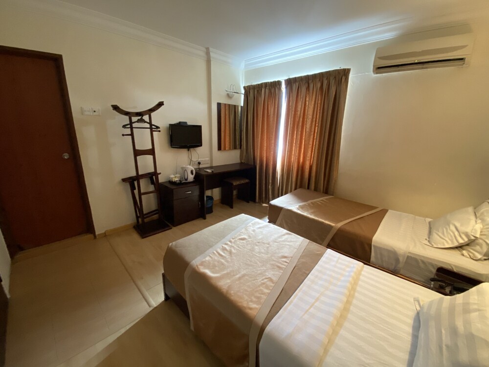 Capital O 89658 Bustani Hotel