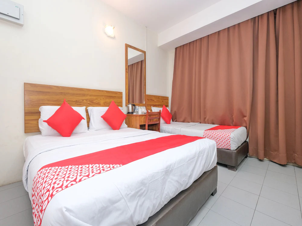 Sun Triang Hotel by OYO Rooms