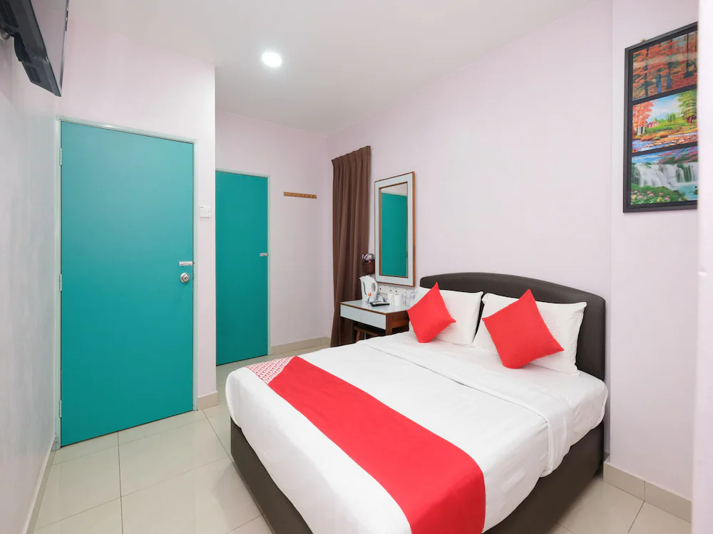 Sun Triang Hotel by OYO Rooms