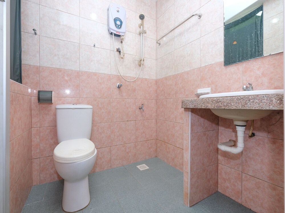 Sun Triang Hotel by OYO Rooms